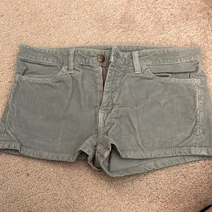 Sea foam colored corduroy material short shorts.